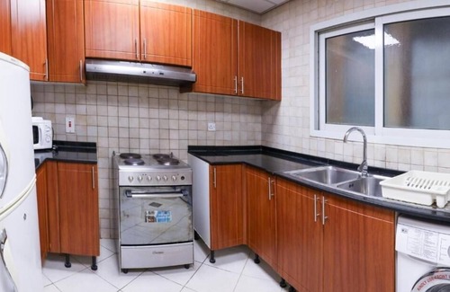 Al Mankhool House | One Bedroom Suite Near Manhattan Avenue By Luxury Bookings
