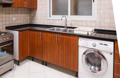 Al Mankhool House | One Bedroom Suite Near Manhattan Avenue By Luxury Bookings