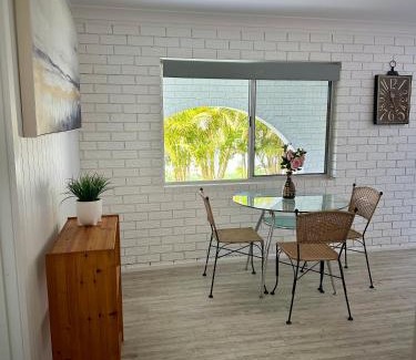 Gold Coast House | One bedroom with shared bathroom ground level of a two-story house