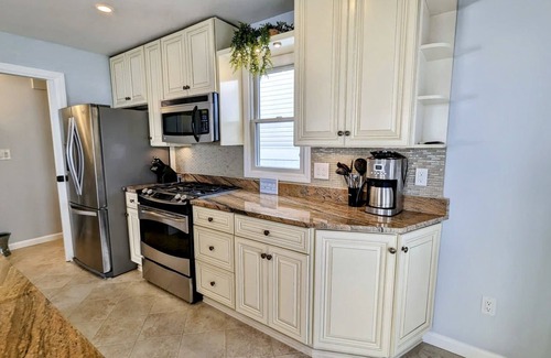 Ortley Beach House | ONE block from the beach. Outdoor lounge seating, perfect for entertaining!
