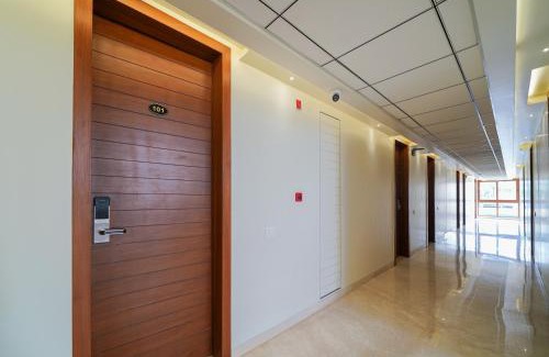 Bengaluru Hotel | Open Hotel by Olive - Tulips Inn and Suites