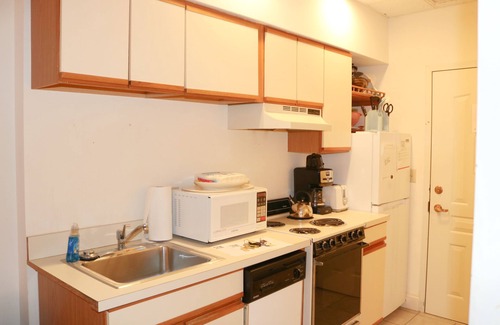 Chautauqua Condo | Originally built in Chautauqua Institution in 1890, the original St. Elmo Hotel building was torn down and rebuilt as a residential condominium. It now offers the convenience of an elevator