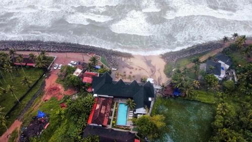 Varkala Hotel | Palm TreeHeritage Beach Resort