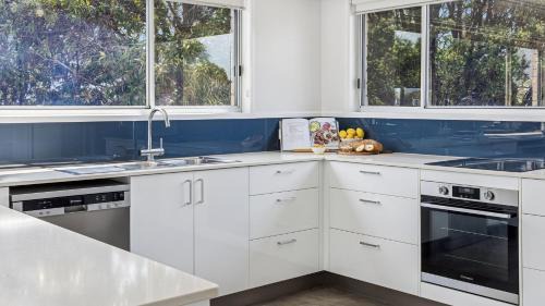 Yamba House | Pandanus - Spacious Waterfront Escape