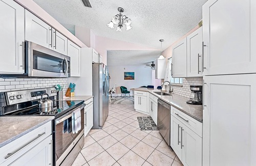 Port Saint Lucie House | Paradise! 3 Bedroom home with private pool, outdoor living space, and lanai