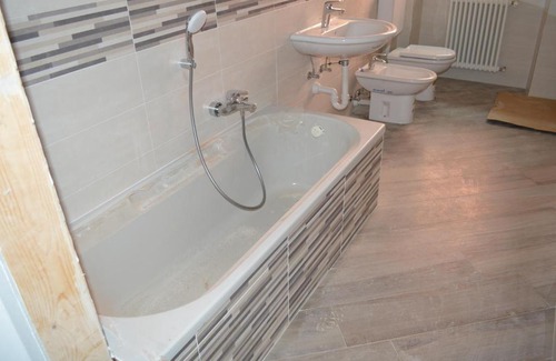 Tirano Apartment | Parravicini Red Flower apartment