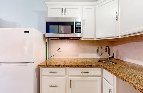 Naples Apartment | Peaceful hotel-style studio with game room, pool, sauna, tennis, BBQ area, gym