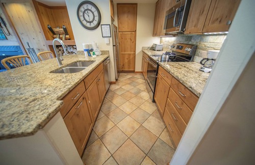 Lakeside Village Condo | Peaceful Unit Close to Keystone Lake and Hot Tub