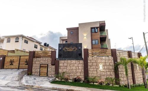 West Gate Hills Apartment | Perfect Stays Ja