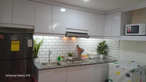 Silang Junction North Apartment | Pine Suites Tagaytay Luxury Spacious 2 Bedroom Condo With Balcony Amenities View