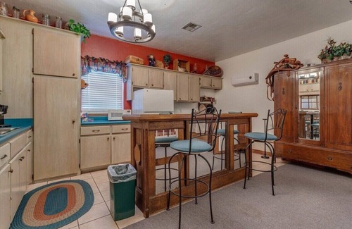 Norman Apartment | Pinecone at Whispering Pines Inn