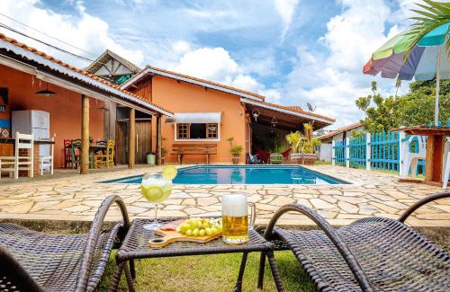 Atibaia House | Piscina Climatizada Fogão a Lenha Espaço Para Fogueira Churrasqueira Quartos aconchegantes