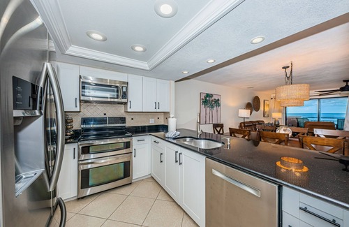 Indian Shores Condo | POOL OPEN ! ELEVATOR IS WORKING! BCHFRONT PENTHOUSE Million View