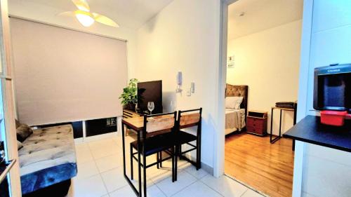 Panamby Apartment | Por do sol desde uma rede na varanda da zona sul