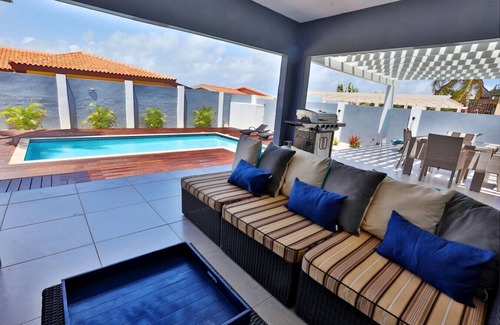 Malmok Villa | Private chef,46 seconds to BEACH,Pool side massage, UTV`s, more