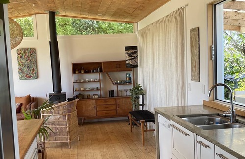 Surfdale House | Private. Sunny. Twin sea views, cedar tub, mediterranean gardens, flat lawns.