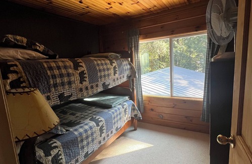 Thendara House | Puchers Place - Spacious, waterfront home on a private non-motorized lake