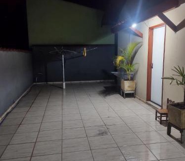 Holambra House | QUARTO CONFORTAVEL COM GARAGEM