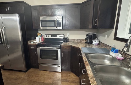 Moorhead House | Quiet Comfort · Spacious Home with Hot Tub & Cozy Vibes