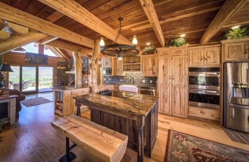 Cody House | Red Roof Ranch, is located on 15 acres with stunning mountain and lake views!