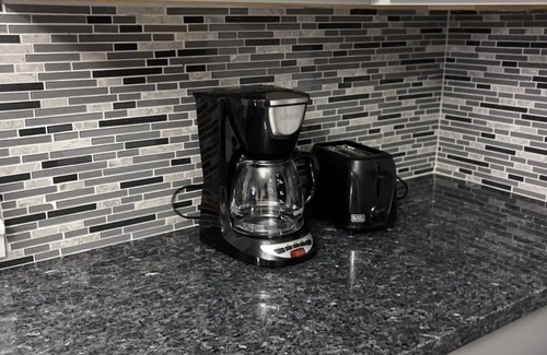 Orange House | Relax with your family in this newly renovated home away from home.
