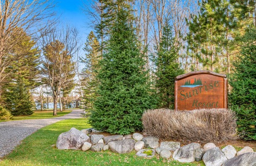 Presque Isle Cabin | Relaxing lake getaway with water views, on-site swimming, fishing, & boating