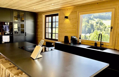 Flumet Ski Chalet | Residence Chez Simone - Chalet Simone overlooking a typical village in Val d'Arly