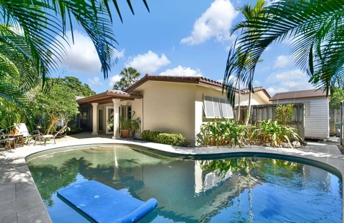 Lighthouse Point House | Retreat to a Quiet Zen Pool Home