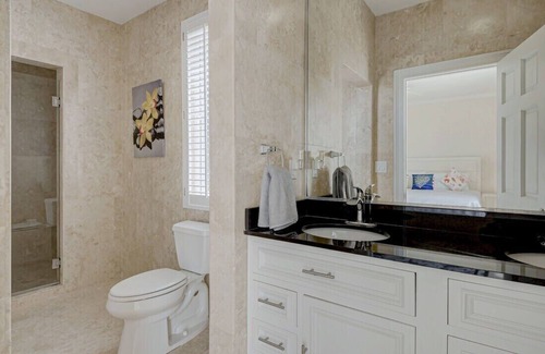 Palm Cay Villa | Right on the Beach | Private Garden | Family Friendly | Grill
