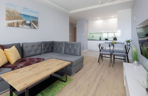 Dziwnow Apartment | Riverfront Apartment by Renters