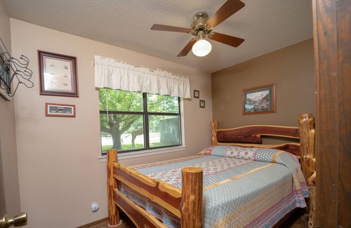 Boswell Cabin | Riverfront Cabin with Bluff Views Covered Deck and Hot Tub