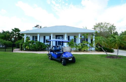 Palm Coast House | Romantic Beach Home with Heated Pool Golf Cart