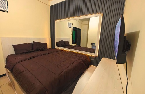 Dinoyo House | Roomy Guesthouse