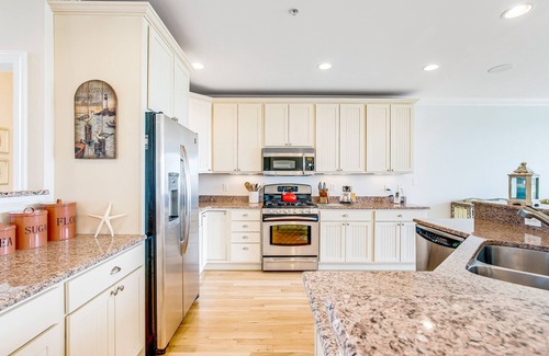 Fenwick Island House | Salt Meadows townhouse w/elevator, gas grill & community pool and pier