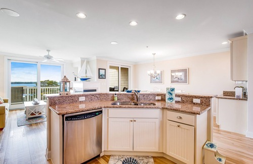 Fenwick Island House | Salt Meadows townhouse w/elevator, gas grill & community pool and pier