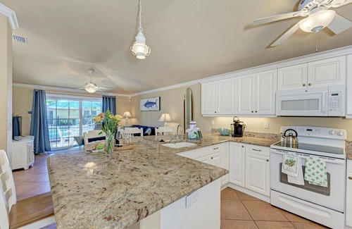 Holmes Beach House | Sand Dollar: Poolside Condo 2 Blocks to Beach by Anna Maria Life Vacation Rentals