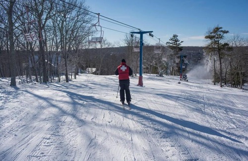 Bushkill Ski Chalet | Saw Creek Chalet with multiple pools by Bushkill Falls