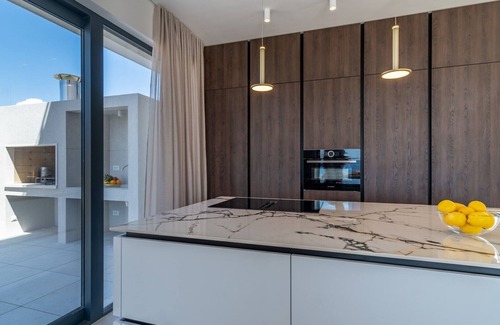 Podstrana Villa | Seaview Villa Nocturno with 4 en-suite bedrooms, private heated 35smq infinity pool with hydromassage and Jacuzzi