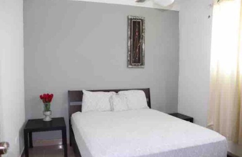 Santiago de los Caballeros Apartment | Self check in , moderno, A/C completo Wifi, TV 4K