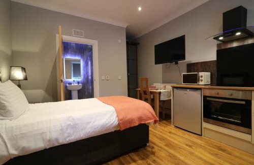 Airdrie Apartment | Signature - Linden Cottage Room 2