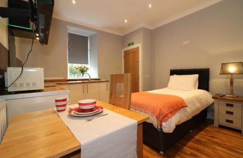 Airdrie Apartment | Signature - Linden Cottage Room 2