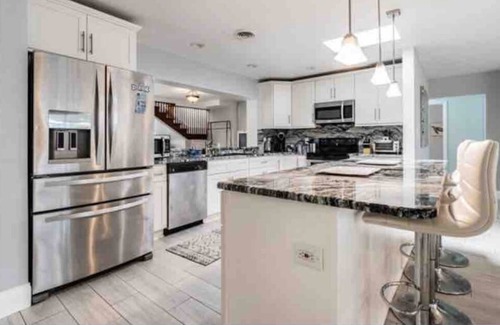 Harbor Bluffs House | Sleeps 16 with Hot Tub & Game Room located near IRB & Clearwater Beach!
