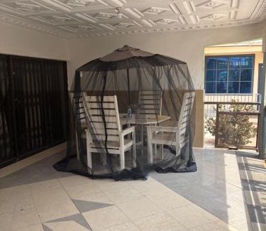 Kumasi Apartment | Sleeps8- Private Secure Parking- Garden- AirCon
