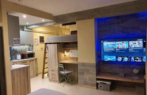 Kypseli Apartment | Smart Cozy Studio at Athens 30 Sqm with yard semi-basement