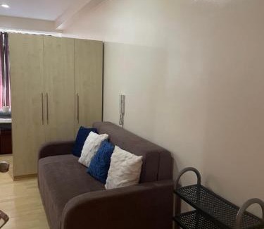 Highway Hills Apartment | SOHO Condotel EDSA Shaw near SM Megamall FREE Pool Access