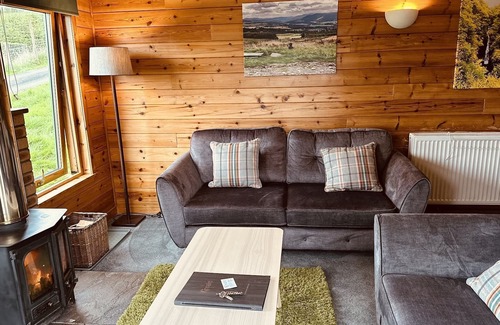 Pitlochry Cabin | Spacious Lodge with woodburner, hot tub and beautiful views from the patio deck.
