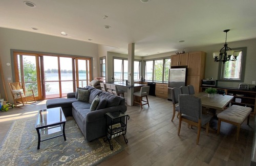 Alburg House | Spectacular Lakefront Home With Patio, Fire Pit, Large Dock and Work Booth.