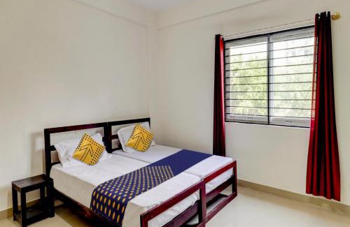 HSR Layout Hotel | SPOT ON Helloworld HSR Castle De Monte