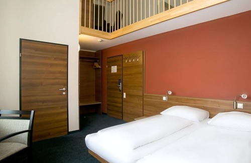 Sankt Lorenzen ob Murau House | Standard room for 4 people with balcony Daily rate HB - Club Hotel am Kreischberg