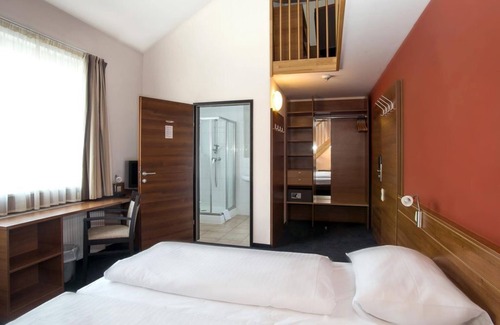 Sankt Lorenzen ob Murau House | Standard room for 4 people with balcony Daily rate HB - Club Hotel am Kreischberg